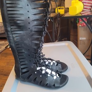 Torrid black lace up tall sandal. Worn once. Size 11.5